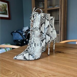 SCHUTZ Snake Print Lace-Up Stiletto Booties in Cream and Black
